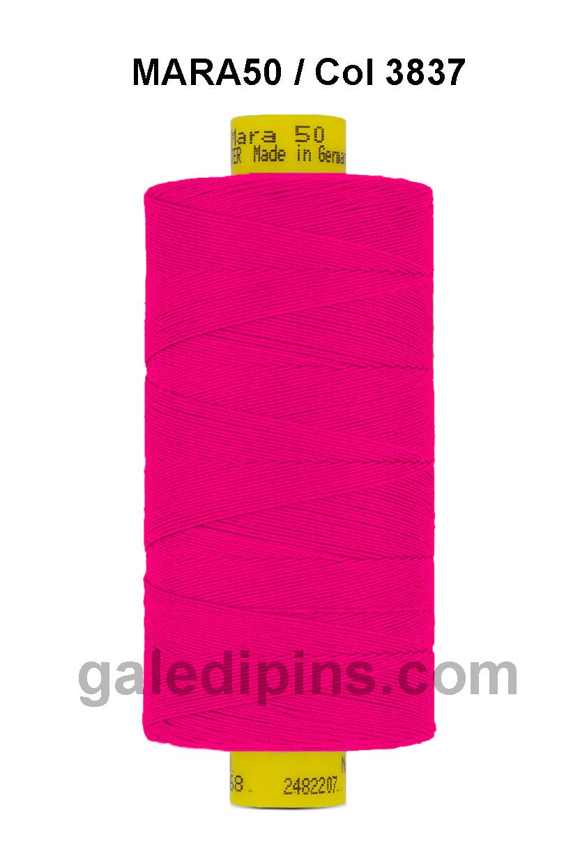 A spool of bright pink Gutermann Mara 50 thread.