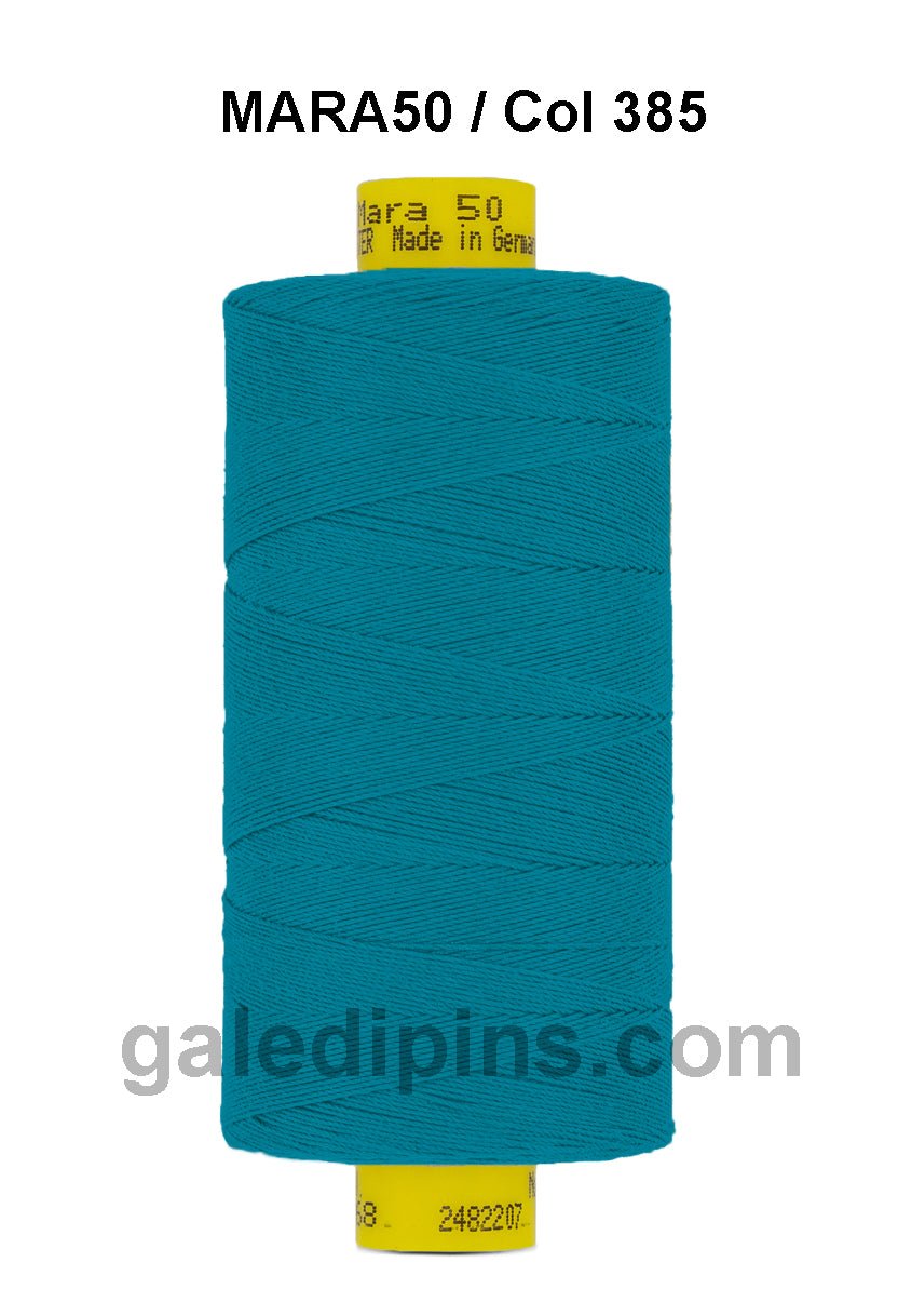 A spool of teal Gutermann Mara 50 thread with "Mara 50 Made in Germany" printed on the yellow top.