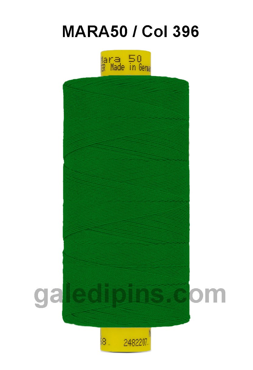 Green Gutermann Mara 50 polyester sewing thread on a spool.