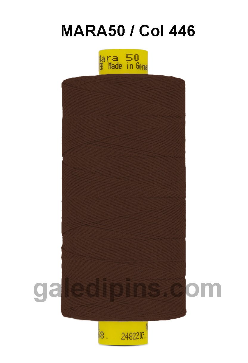 Brown Gutermann Mara 50 polyester thread on a spool.