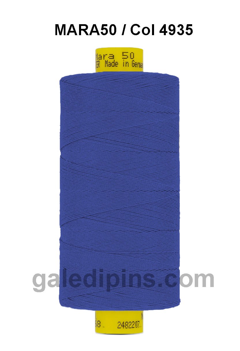 Gutermann Mara 50 thread, blue spool with yellow label.