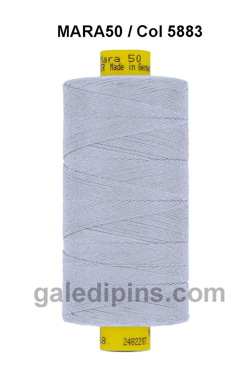 Gutermann Mara 50 thread in light grey on a spool.