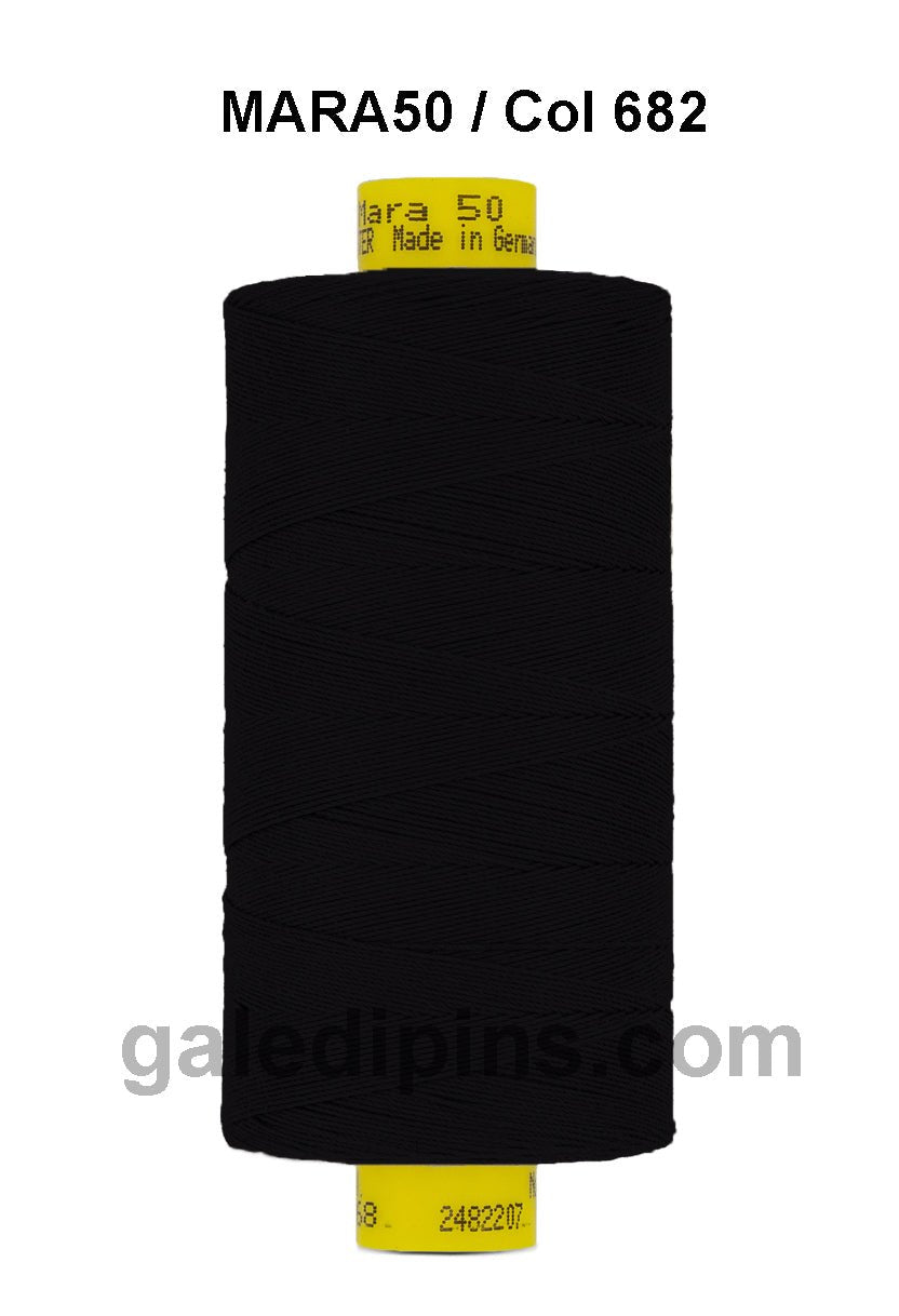 Gutermann Mara 50 black polyester thread on a spool.