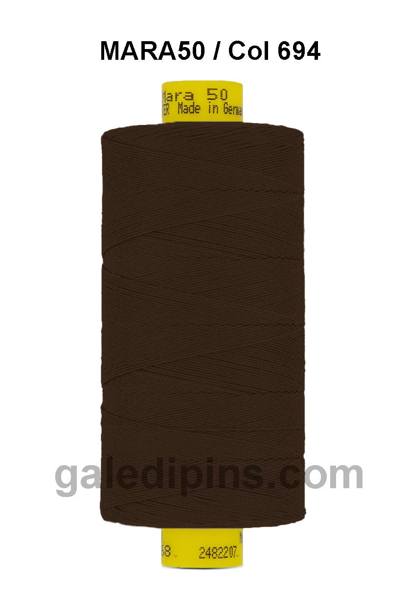 Brown Gutermann Mara 50 polyester thread on a spool.