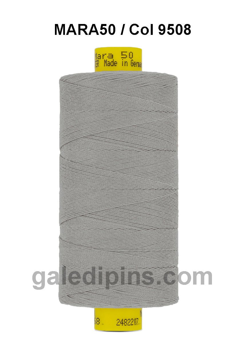 Gutermann Mara 50 grey polyester sewing thread on a spool.