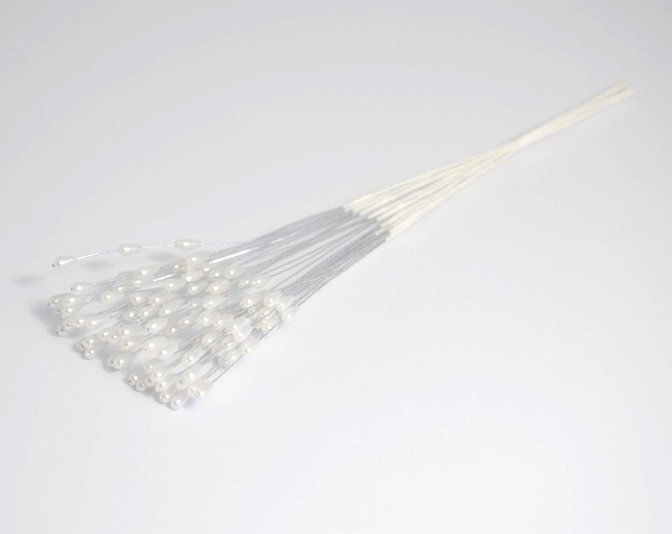 Pack of 12 white oval pearl picks on silver wire stems for floral arrangements.