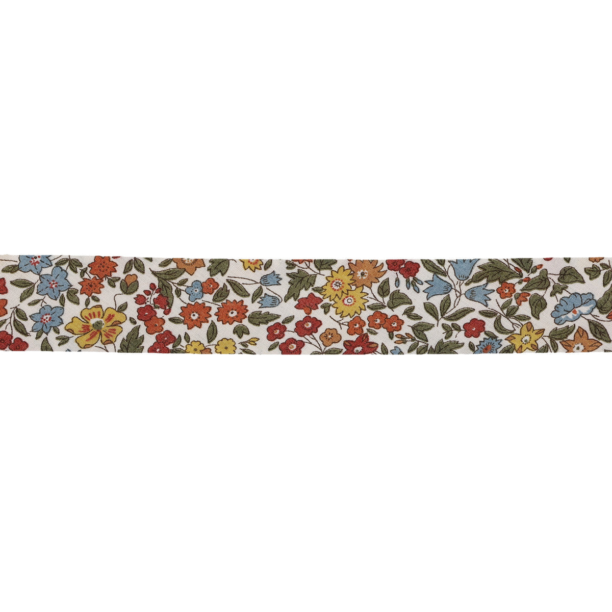 Liberty print bias binding with a colorful floral pattern in red, yellow, and blue on white cotton.