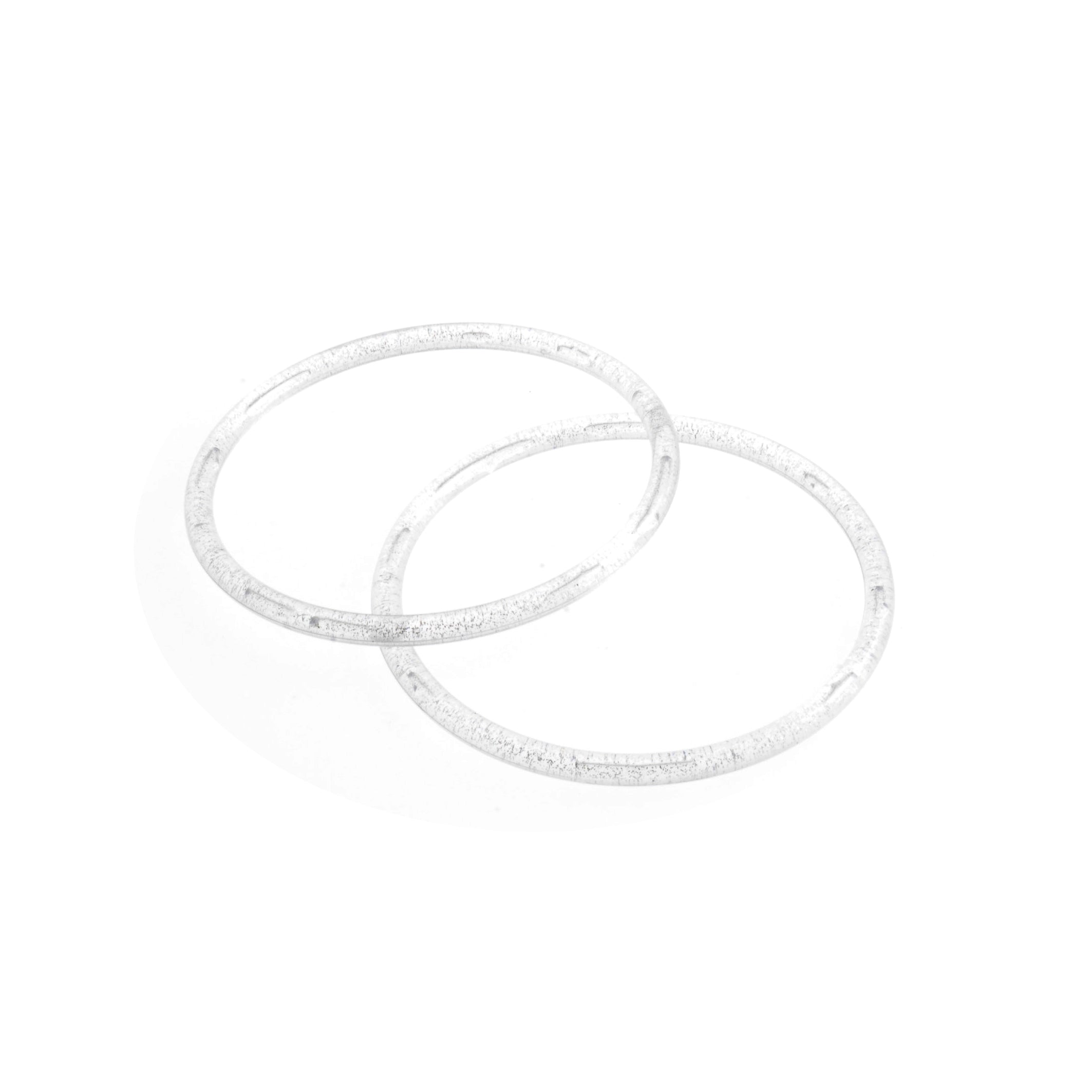 Two round, clear plastic bag handles with a textured finish, shown as a pair on a white background.