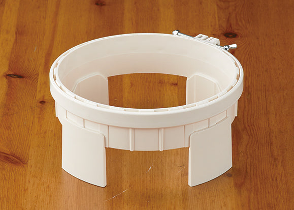White Clover Punch Needle Hoop with adjustable height legs and anti-slip system on a wooden surface.
