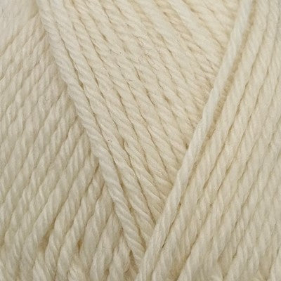 Close-up of Stylecraft Naturals Pure Wool DK yarn in a cream shade showing twisted strands.