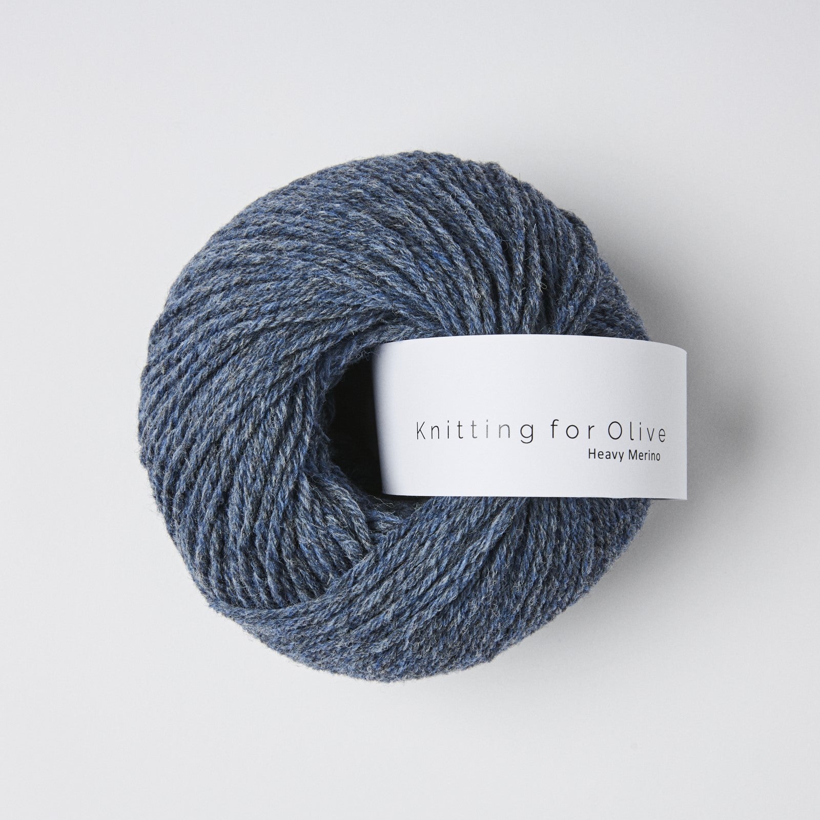 A ball of blue Heavy Merino yarn from Knitting for Olive.