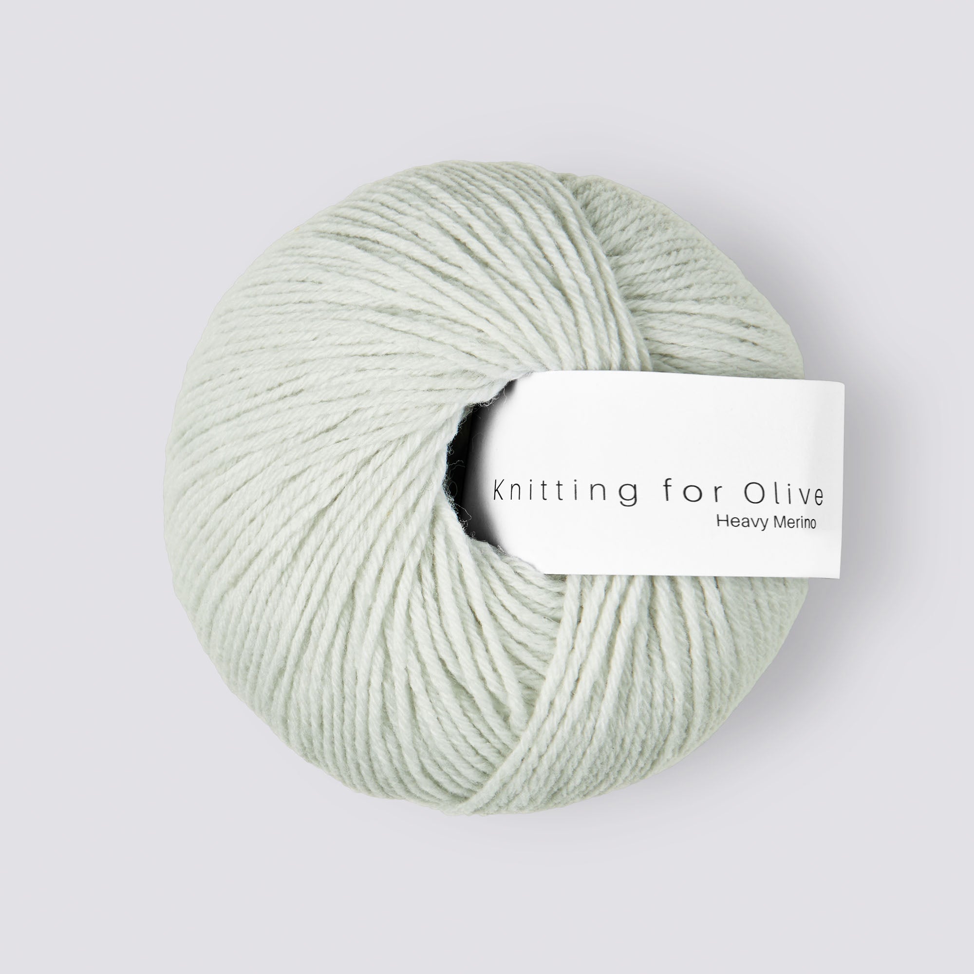 A ball of light green Heavy Merino yarn from Knitting For Olive.