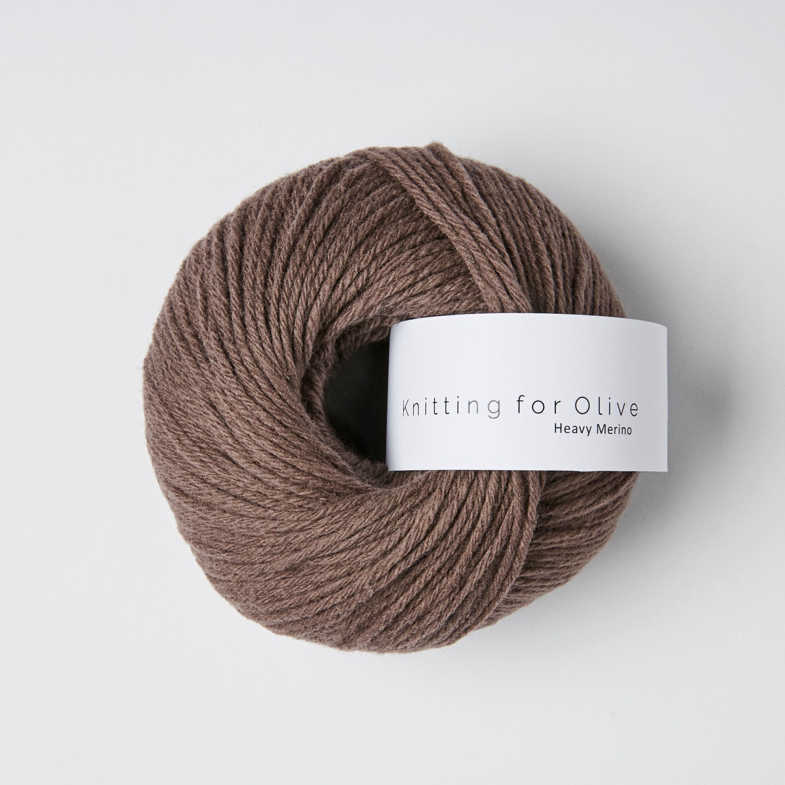 A ball of brown Heavy Merino yarn from Knitting for Olive.