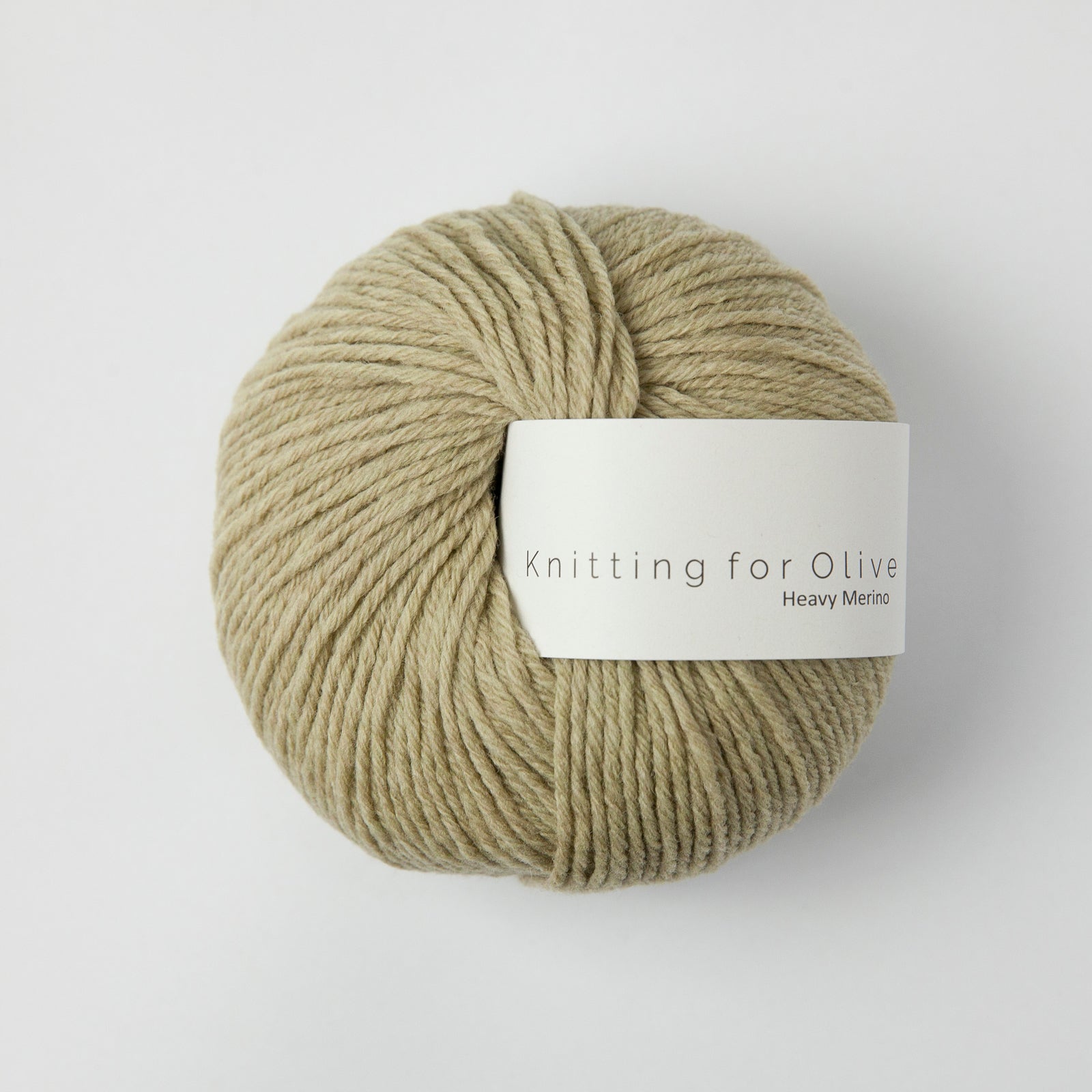 A ball of tan Heavy Merino yarn from Knitting For Olive.