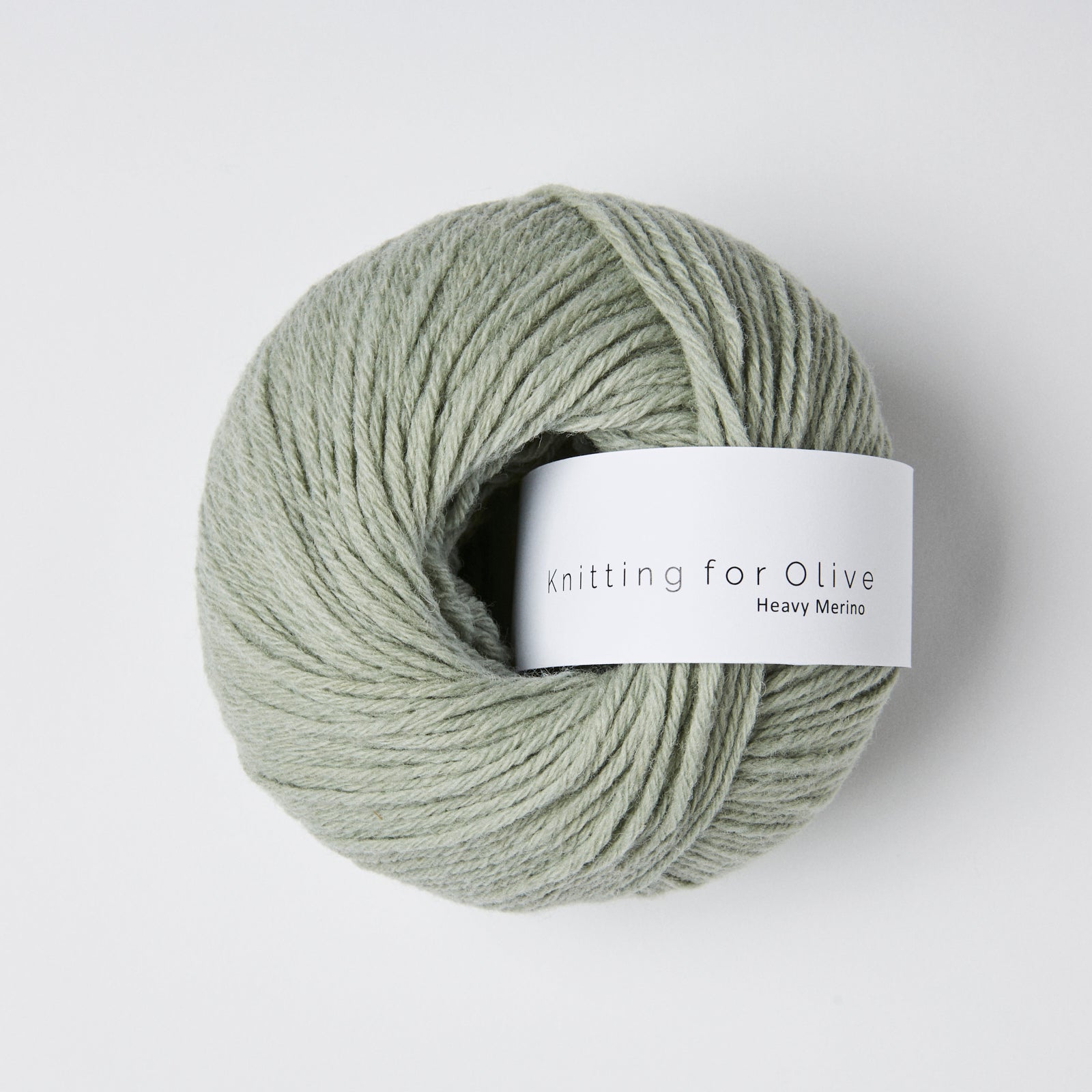A ball of light green Heavy Merino yarn from Knitting For Olive.