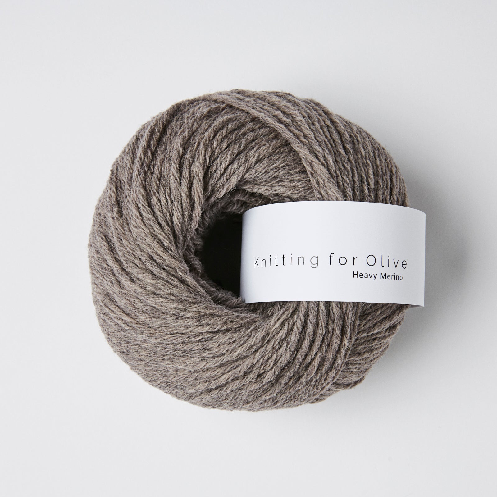 A ball of taupe Heavy Merino yarn from Knitting For Olive.