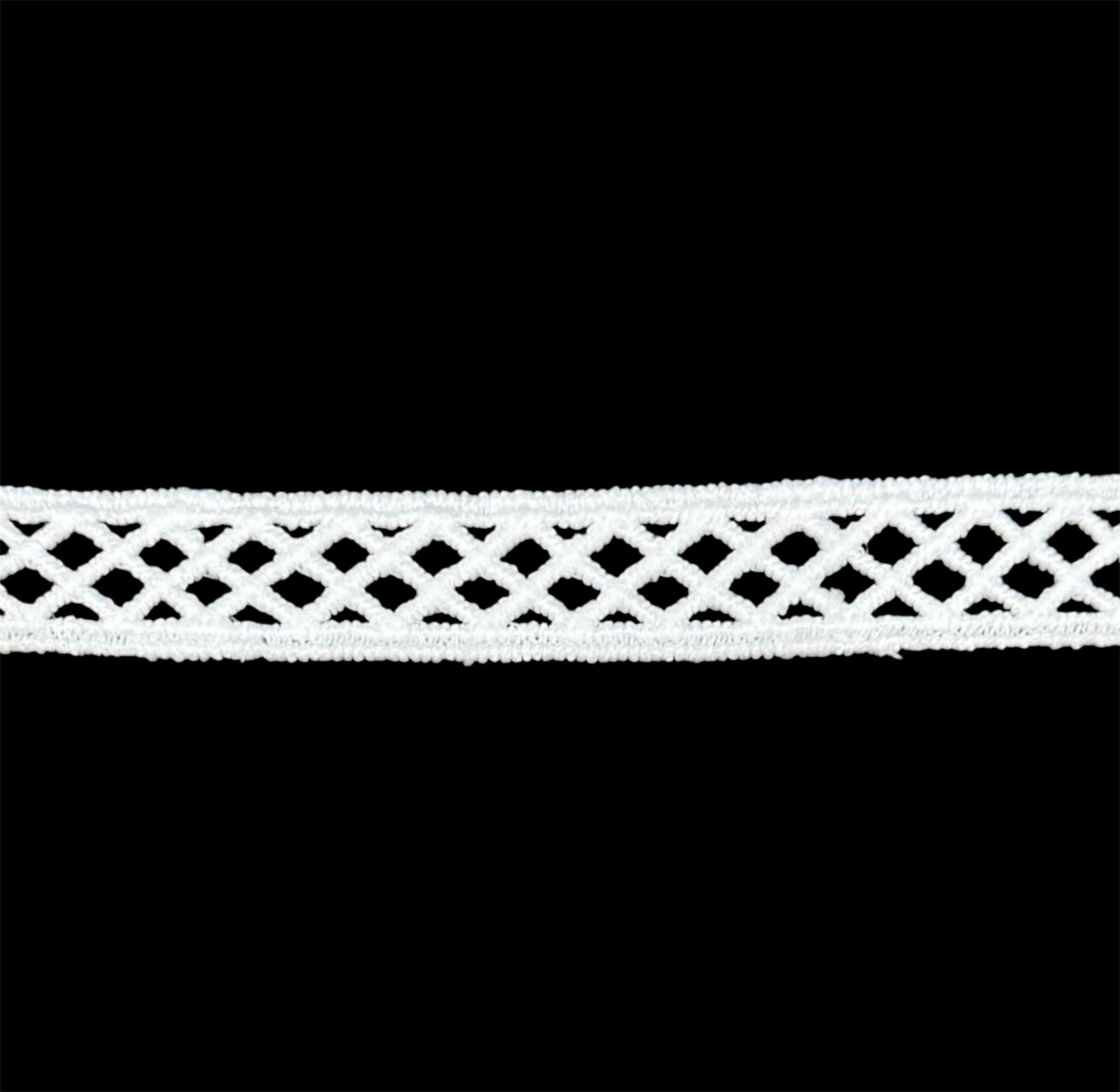 15mm white rhombus pattern trim with geometric openwork design on a black background.