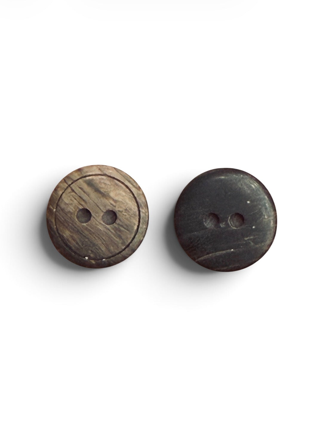Two 15mm brown natural wood circular sewing buttons with a 2-hole design on a white background.