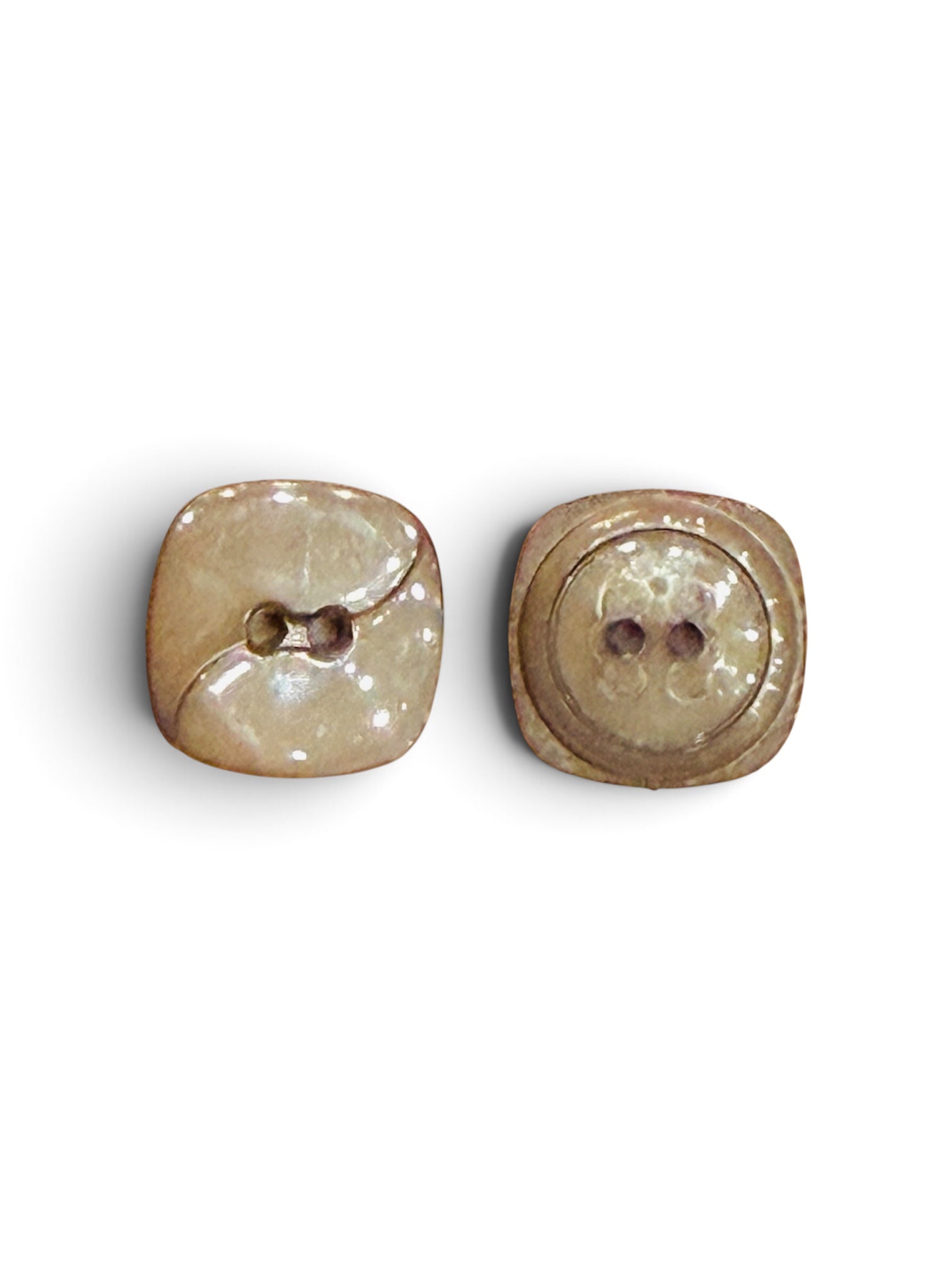 Two 16mm brown resin sewing buttons with a 2-hole design and square-like rounded shape.