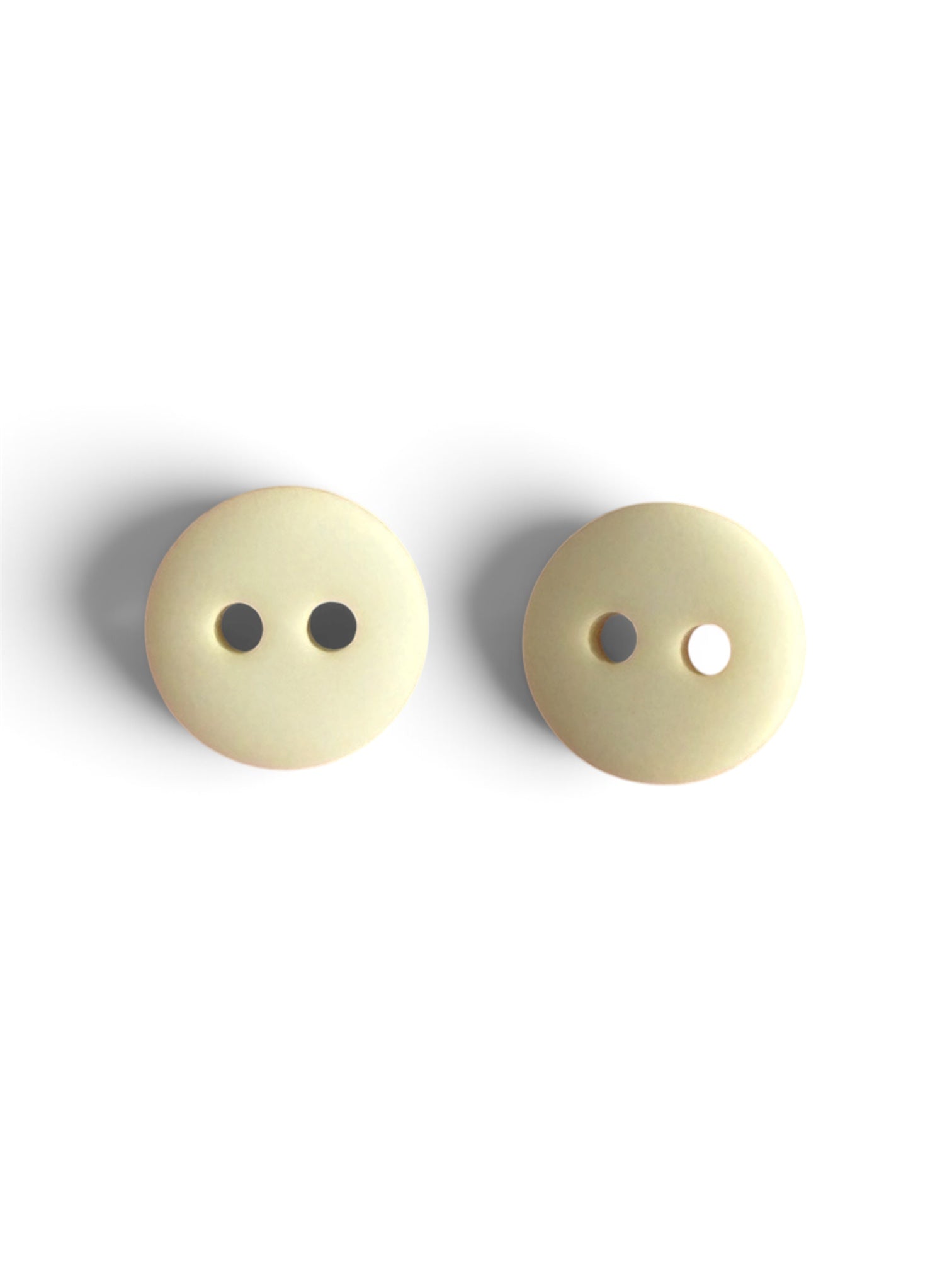 Two 10mm ivory resin round buttons with a smooth finish and two-hole design on a white background.