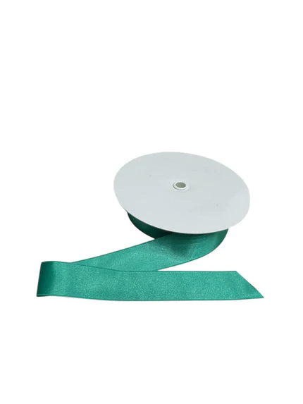 Teal double-faced satin ribbon on a white spool.