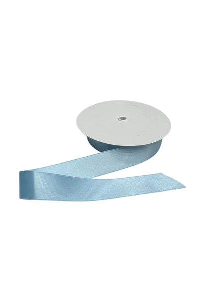 Light blue double-faced satin ribbon on a spool.