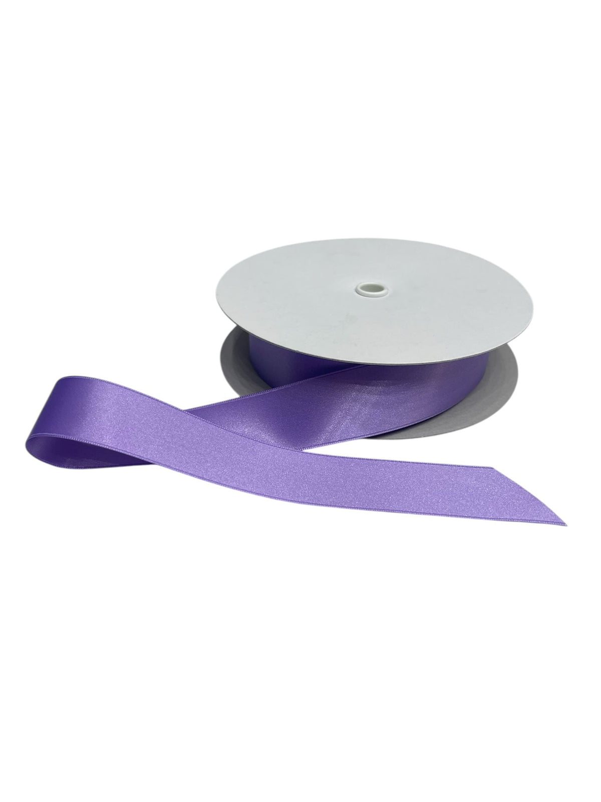 A spool of purple double-faced satin ribbon with a length of ribbon unwound.