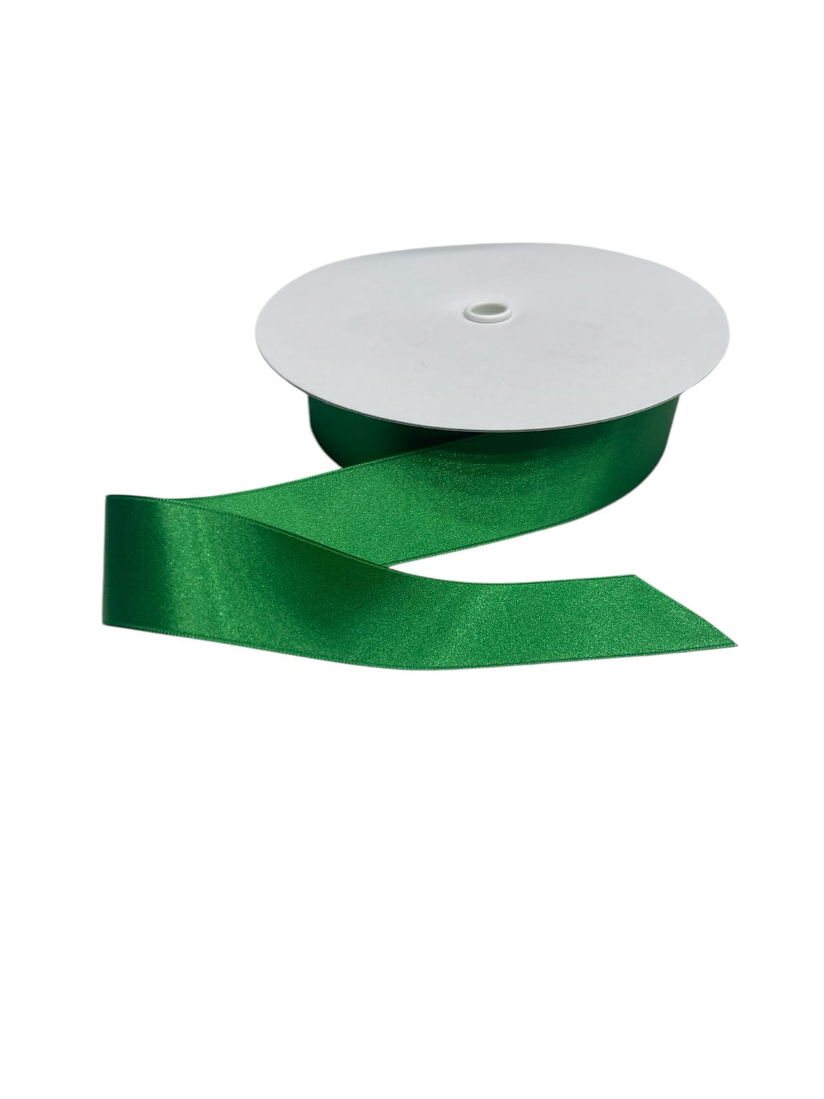 A roll of emerald green double-faced satin ribbon with a cut end.