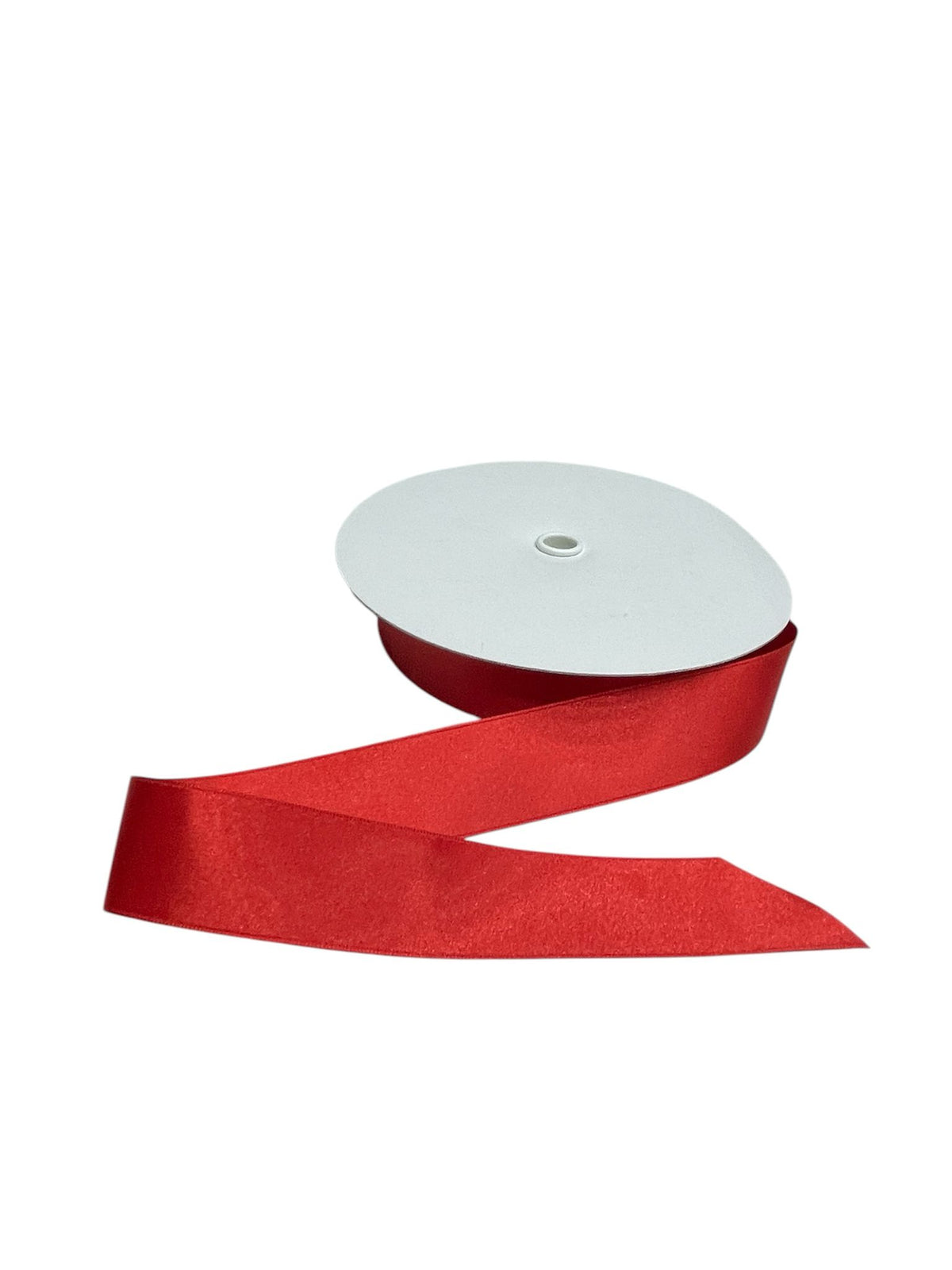 Red double-faced satin ribbon on a spool.