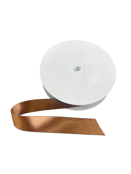 A spool of bronze double-faced satin ribbon made from recycled polyester.