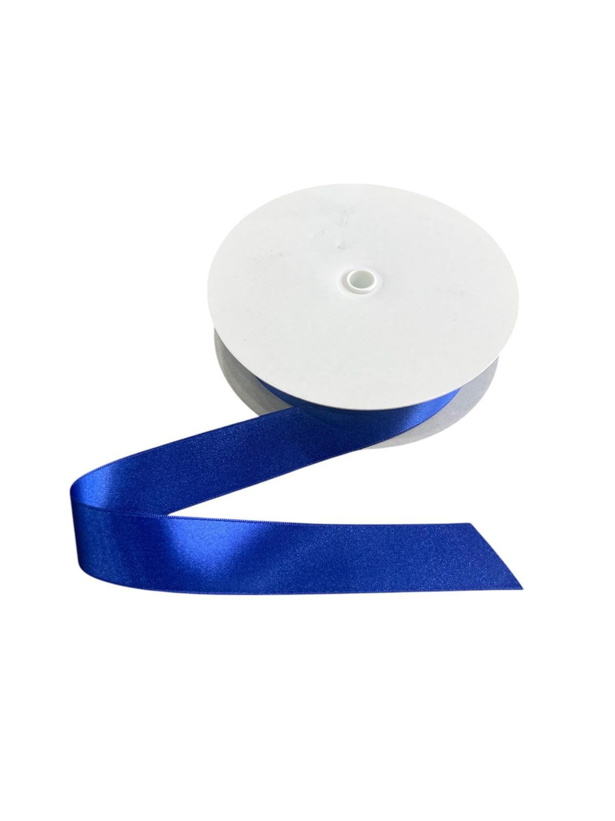 A spool of royal blue double-faced satin ribbon with a cut end.