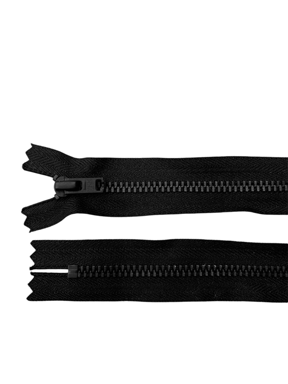 Black YKK metal zipper with closed end.