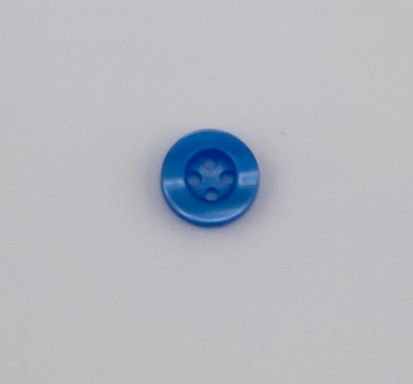 Blue polyester button with four holes.