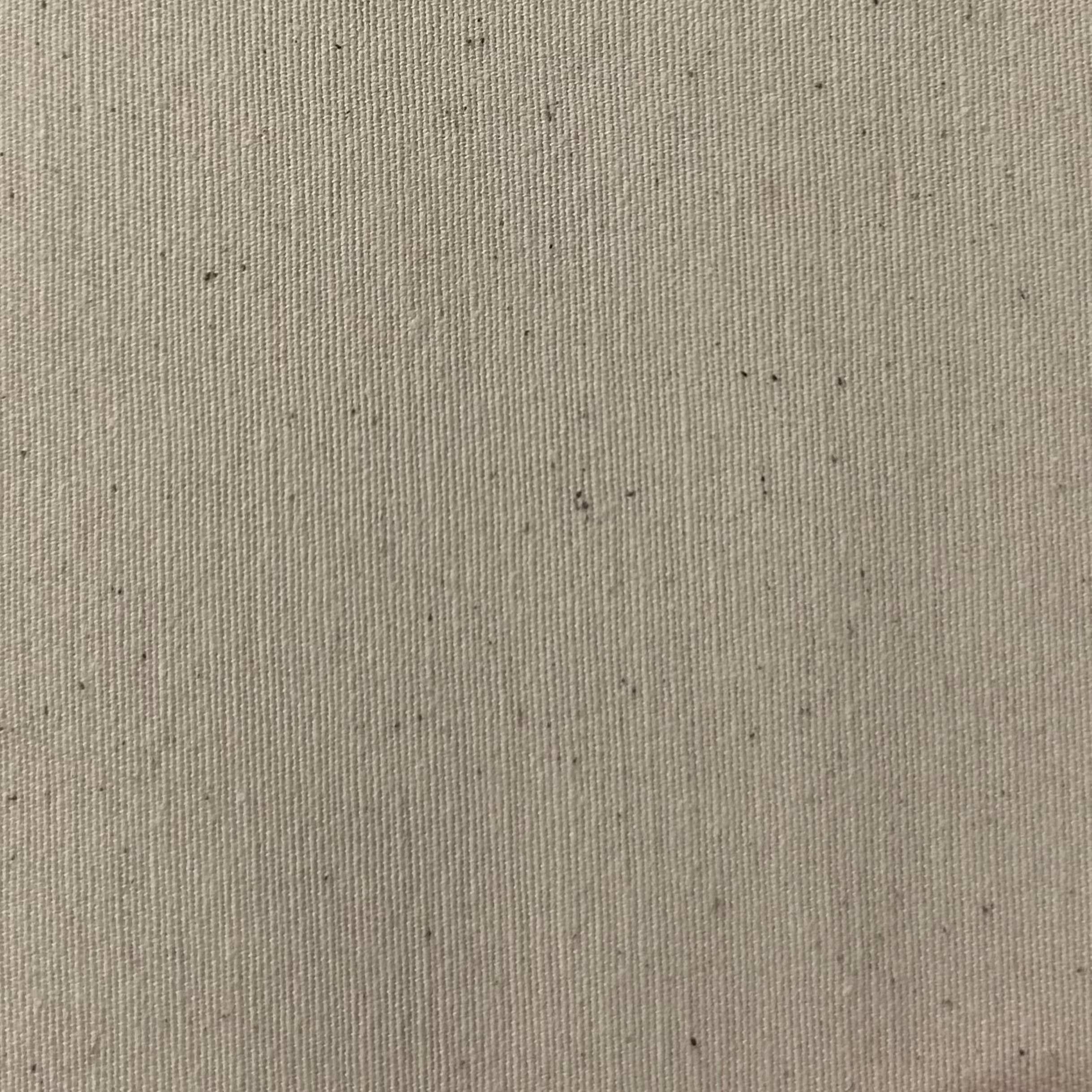 Calico fabric with a natural cotton color and visible weave texture.