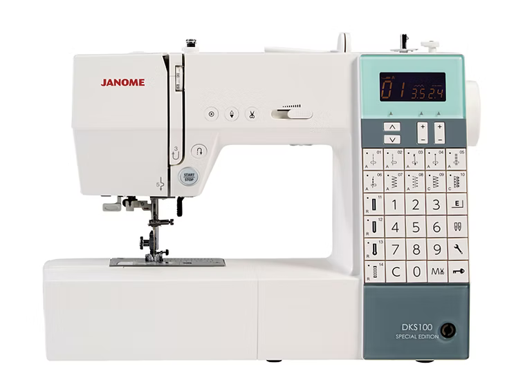 Janome DKS100 SE computerized sewing machine with digital display and stitch selection keypad.