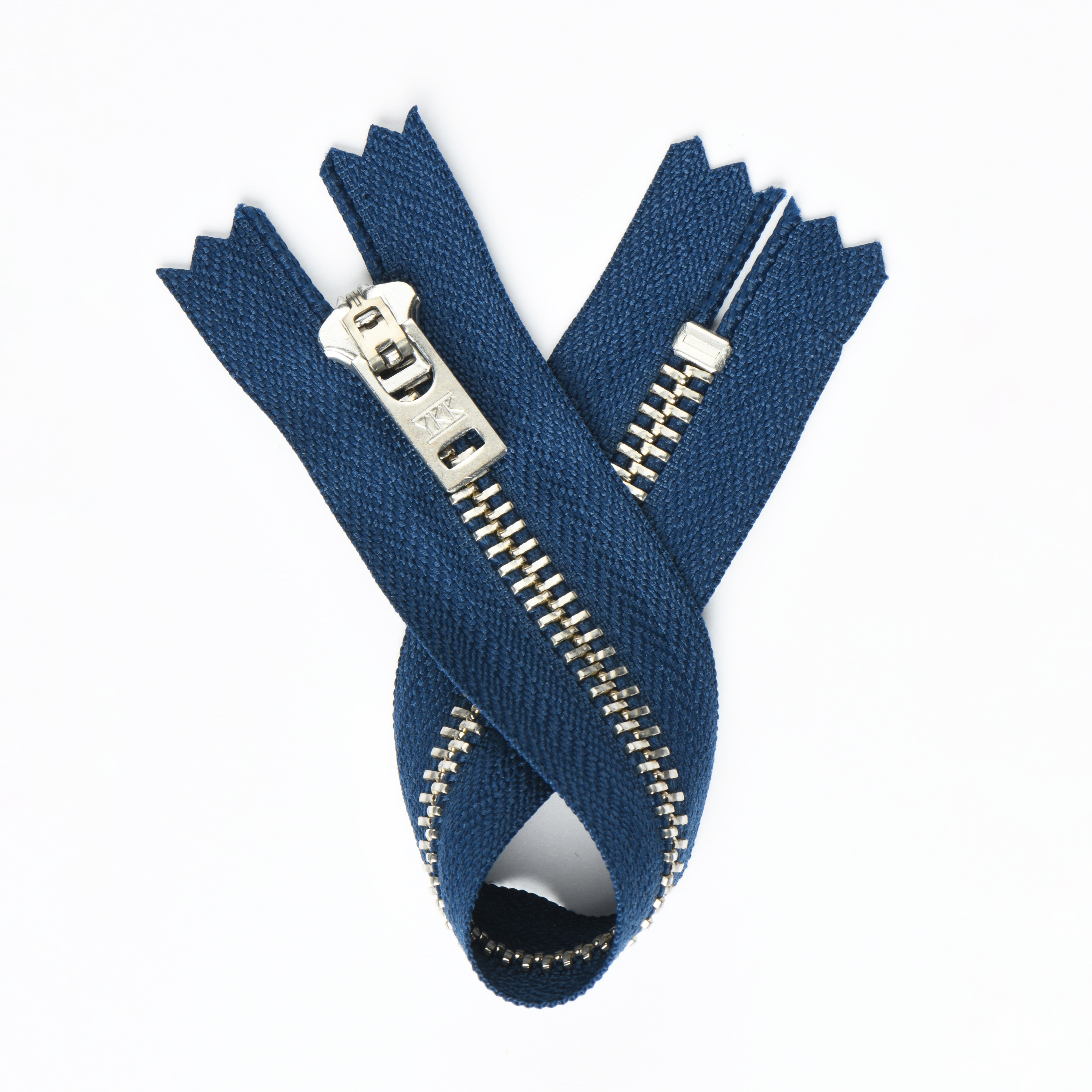 YKK silver metal C5 closed end zip in dark blue.
