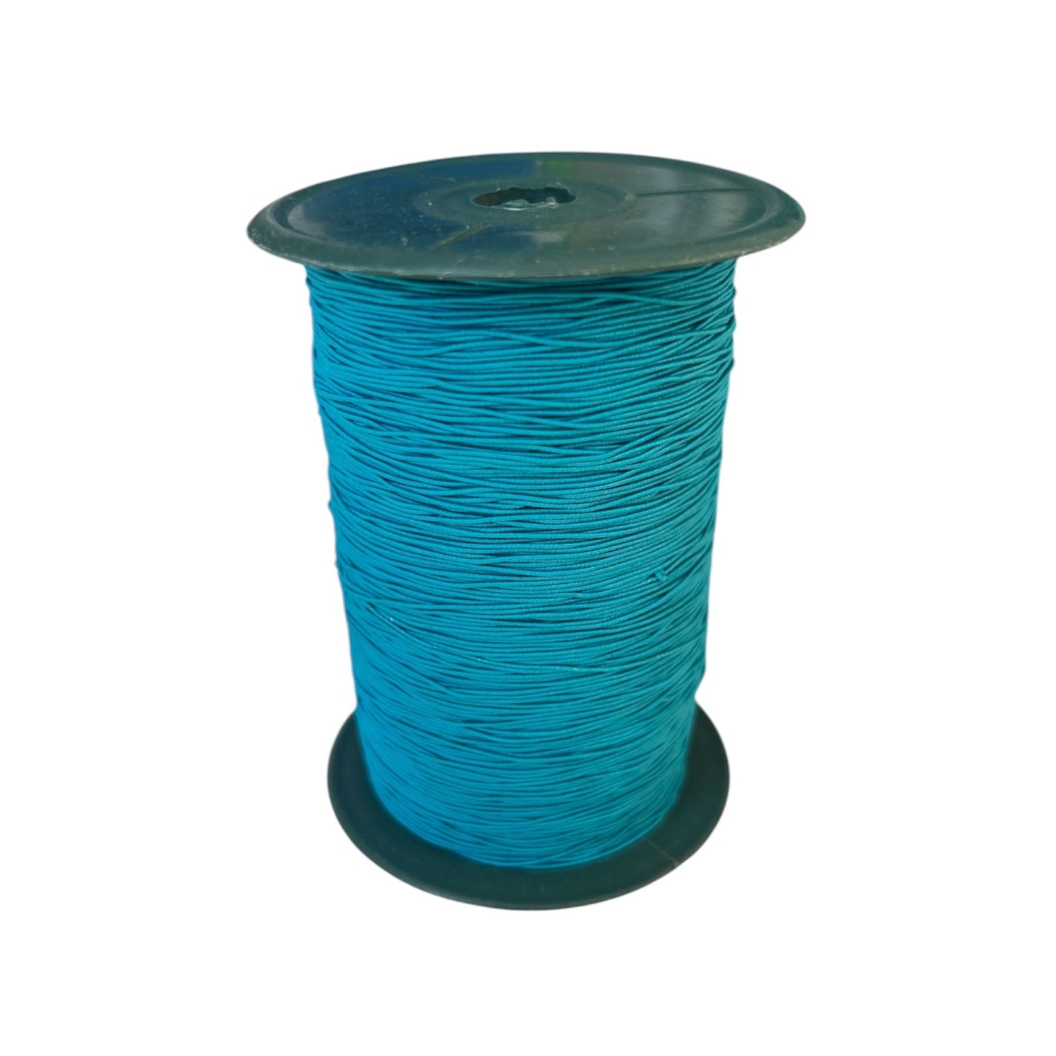 A spool of thin, teal-colored coated elastic cord.
