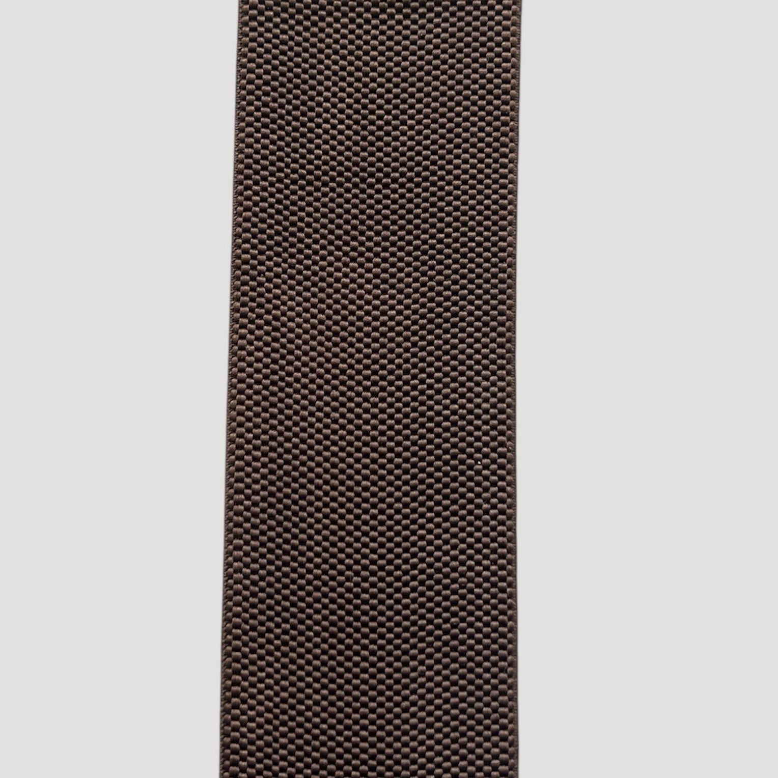 Wide elastic tape in a brown woven texture.