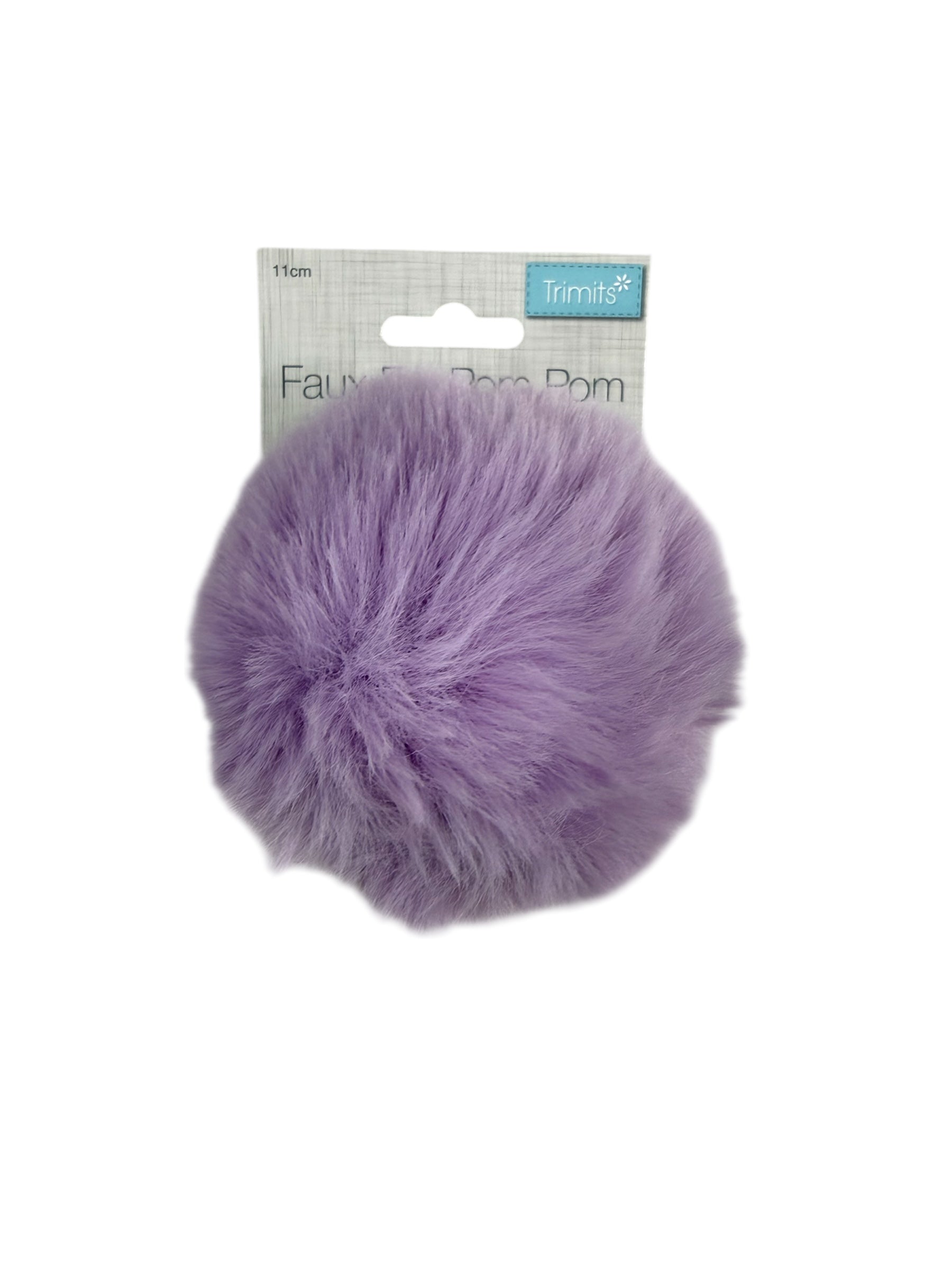 A fluffy, lavender faux fur pompom with a Trimits tag.