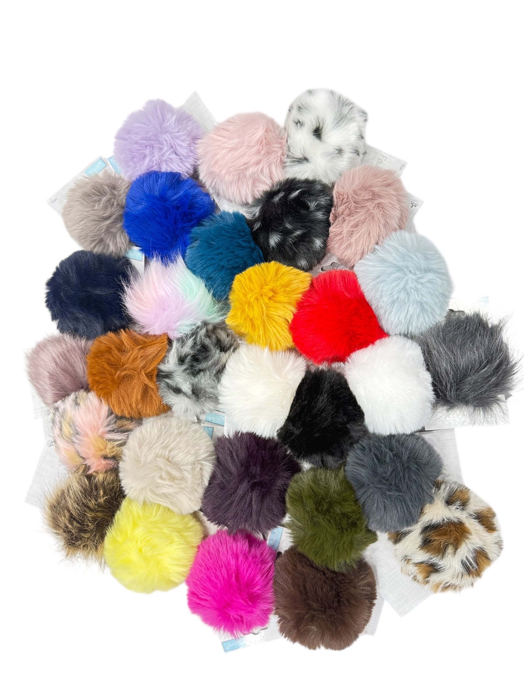 A collection of 11cm faux fur pompons in various colors.