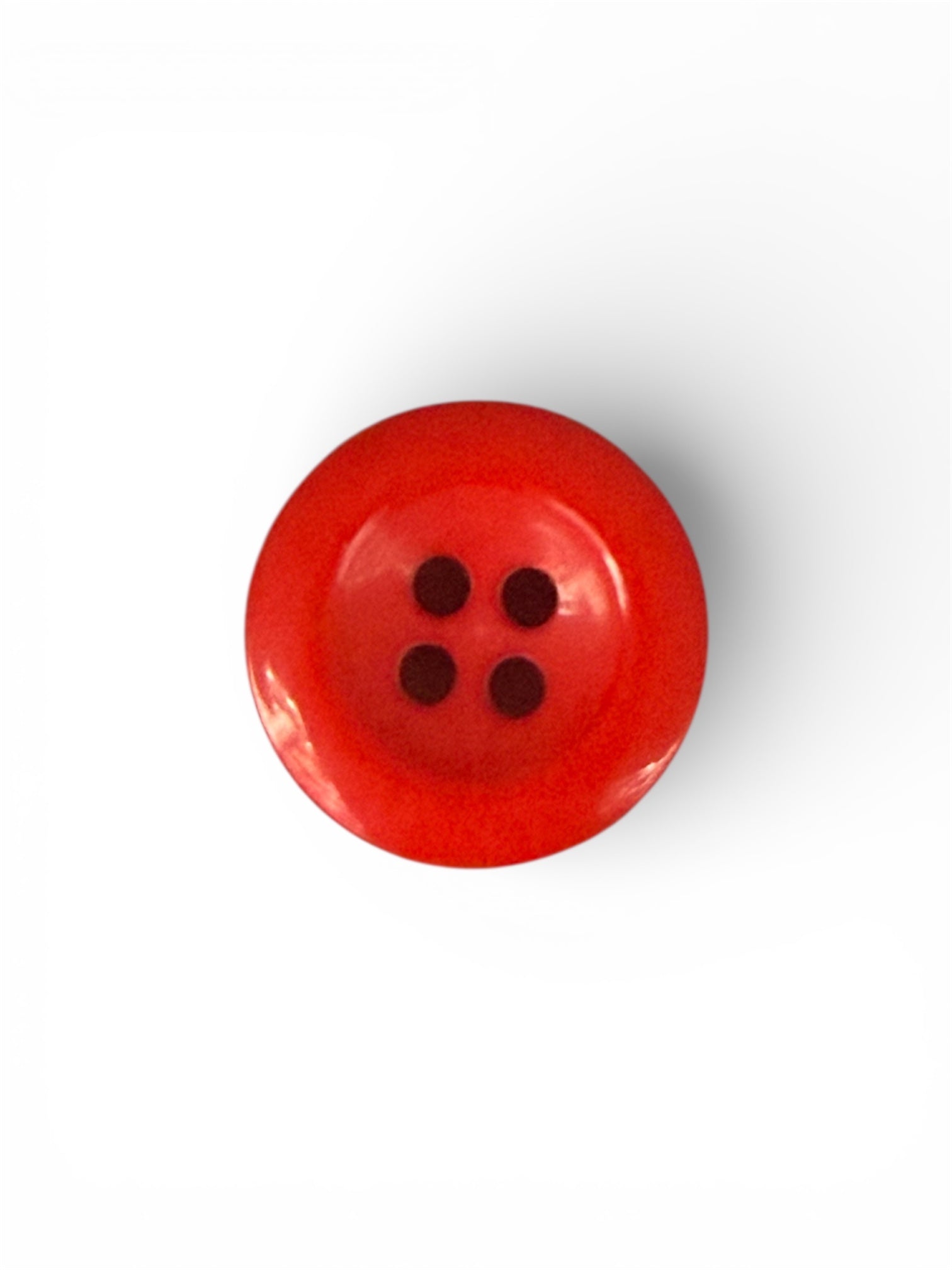 Red round 15mm 4-hole nylon sewing button.