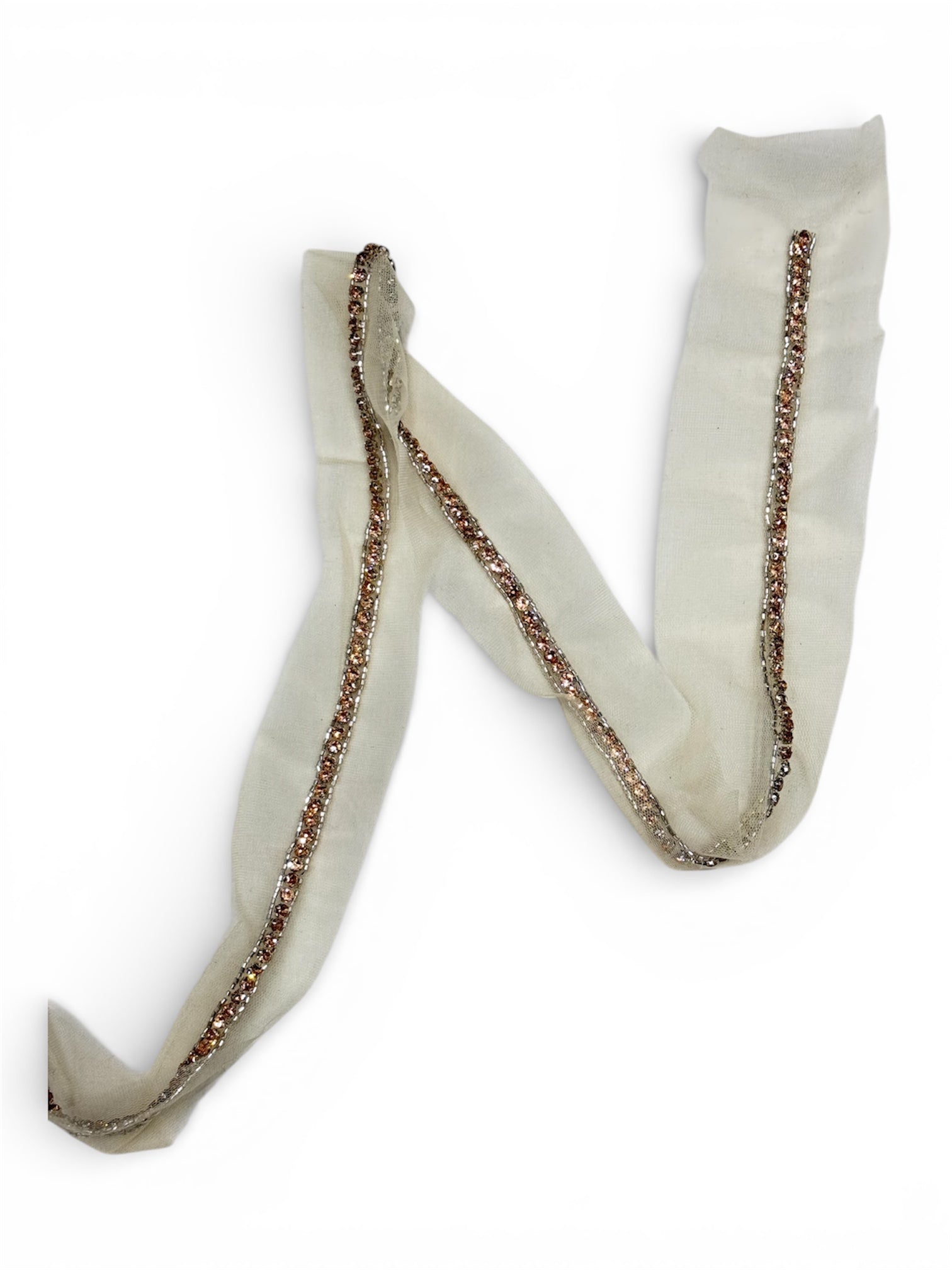 Strong beige netted trim with beaded edge.