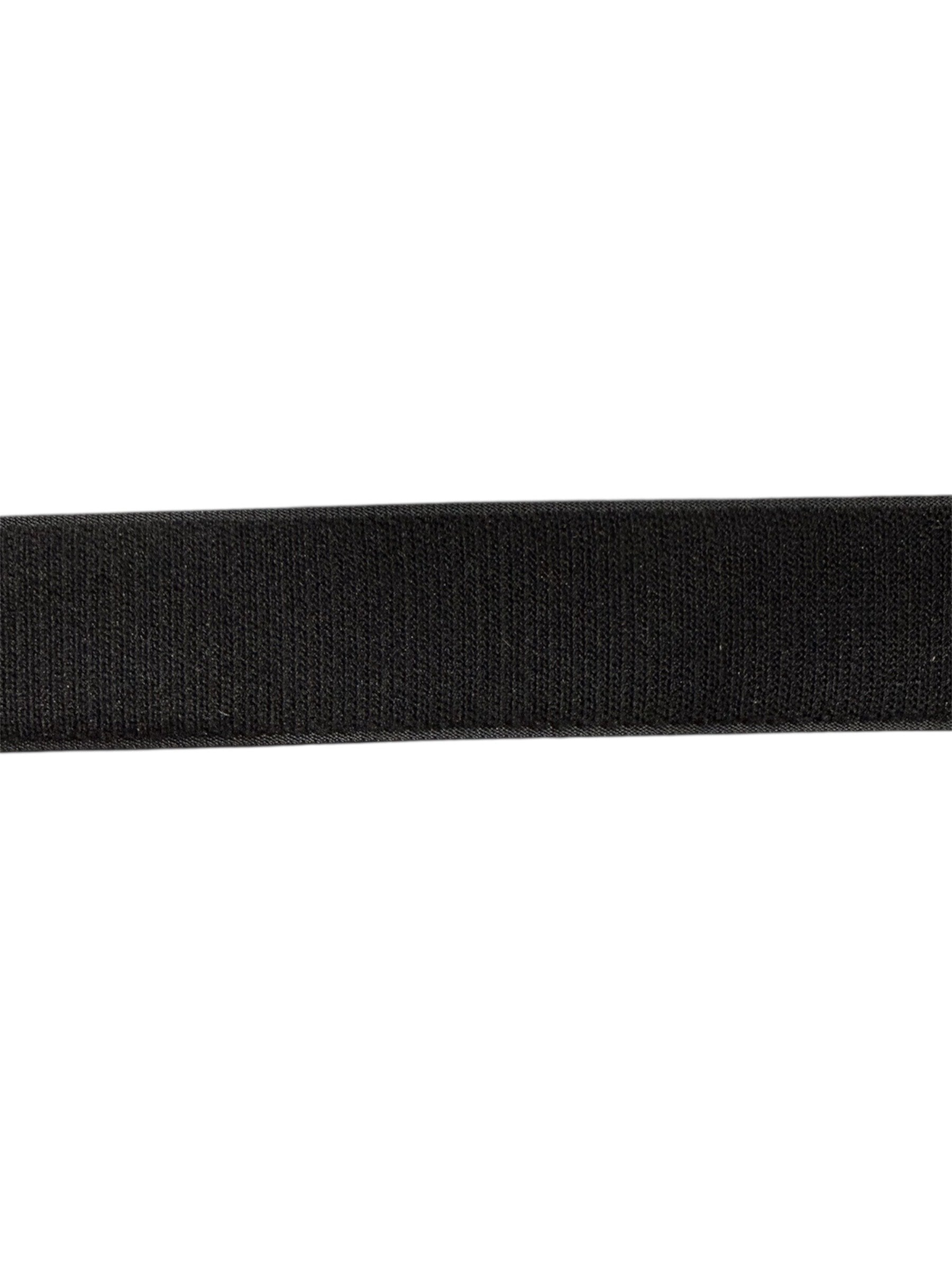 Close-up of a black Marushin knit stretch tape with a soft, matte textured finish.