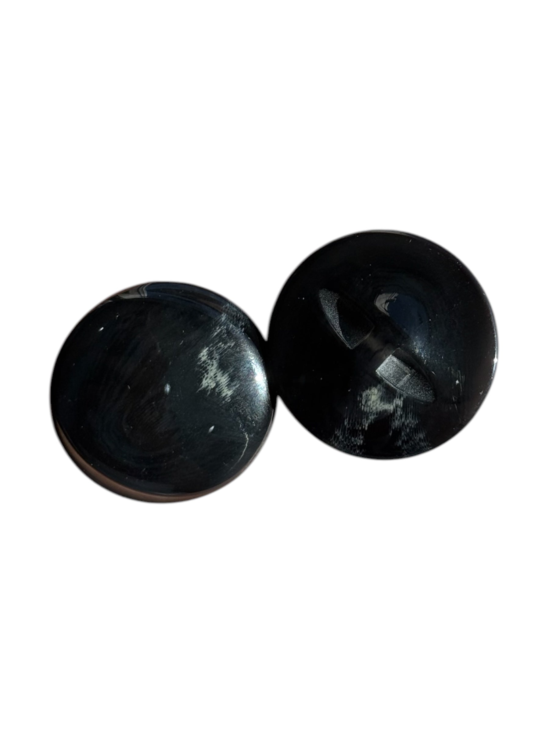 Two round 30mm black plastic buttons with a white patch and two-hole center.