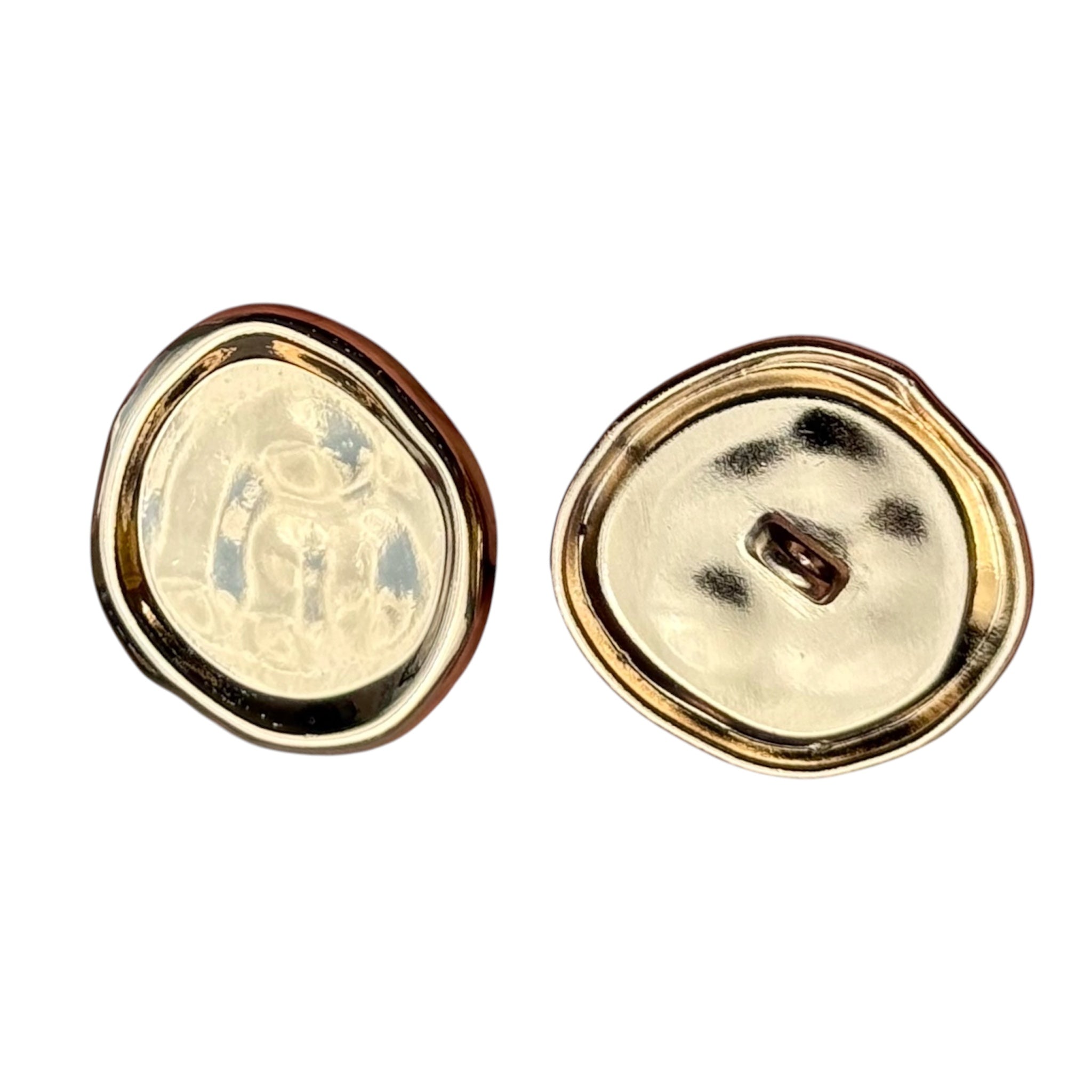 Two round shiny gold metal buttons showing front and back with a shank attachment.
