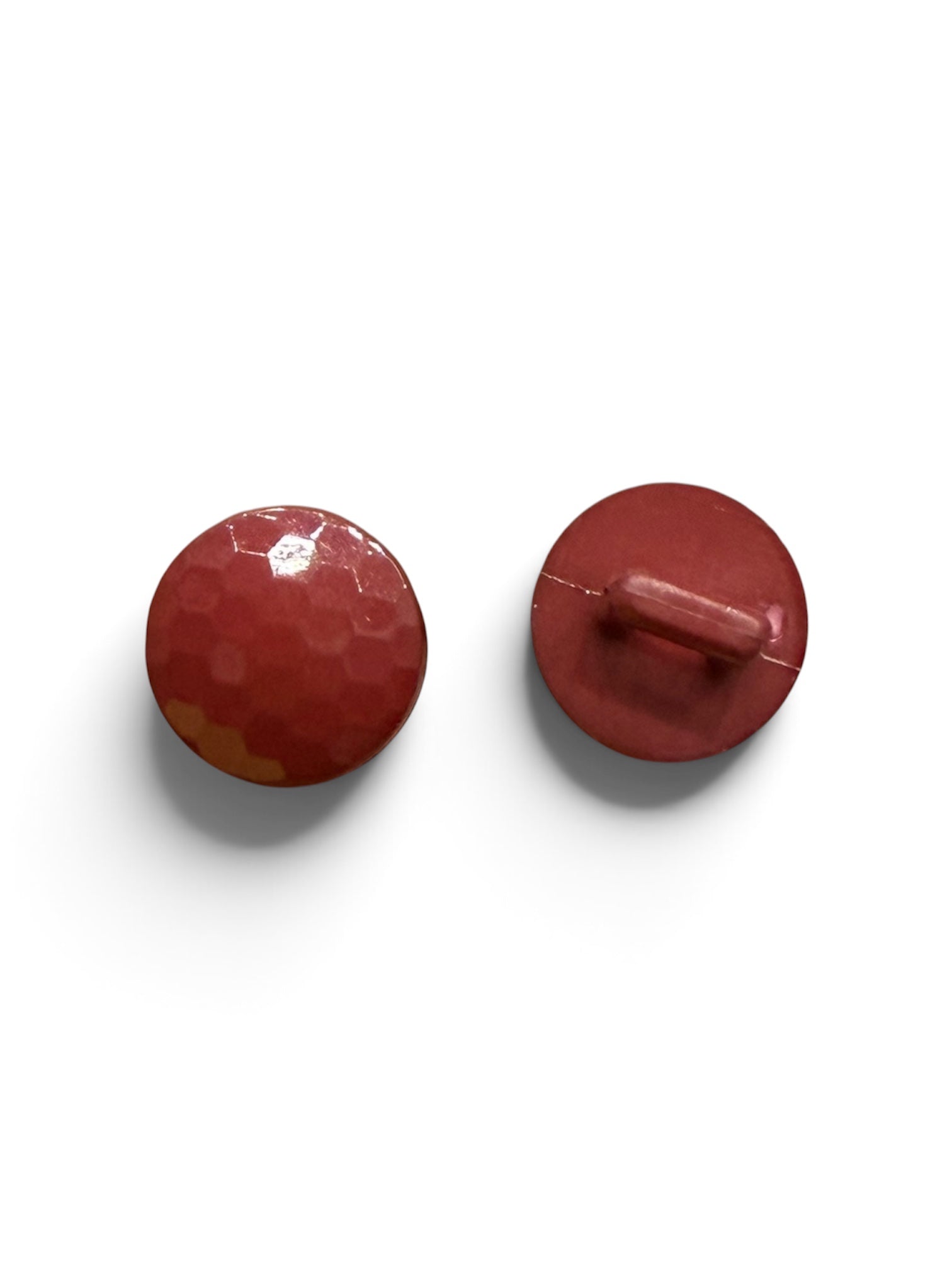 Two 12mm burgundy round resin sewing buttons showing the textured shiny front and the shank back.