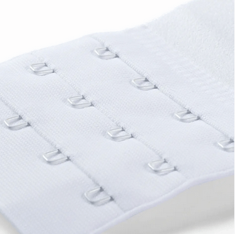 White bra extender with three rows of four hooks.