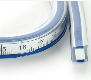 Flexible curved ruler with cm and inch scales.