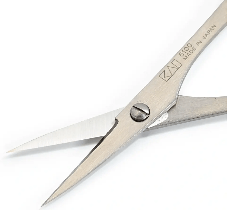 Close-up of KAI 5100 embroidery scissors made in Japan.