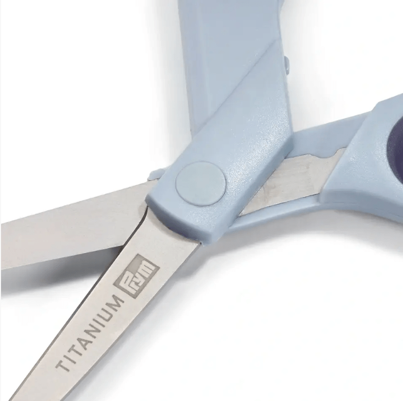 Grey titanium-coated scissors with a comfortable grip.